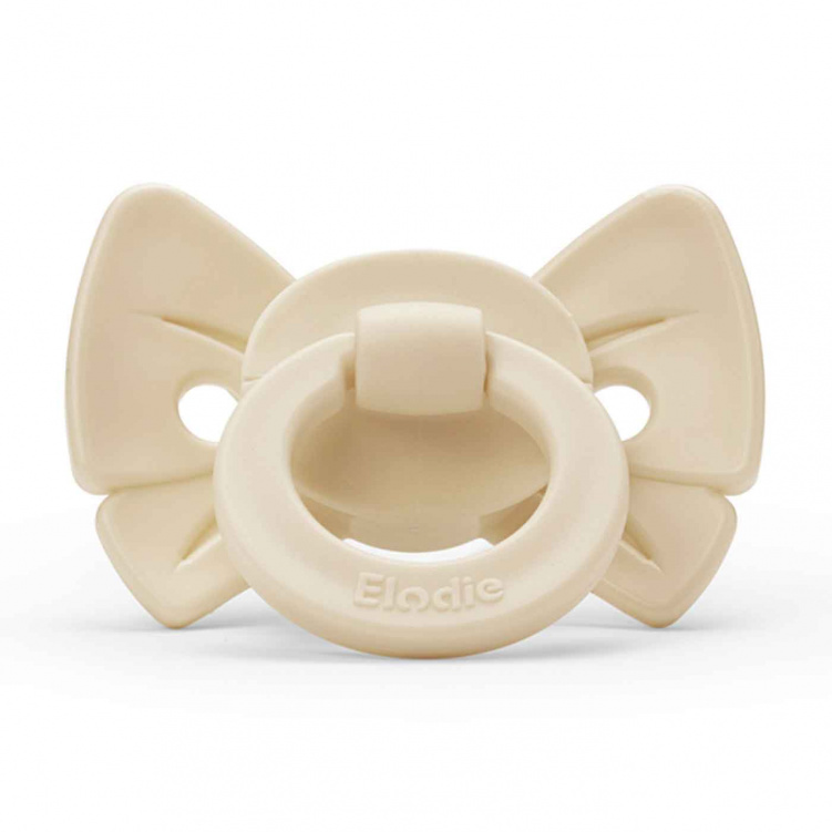 Elodie Binky Bow Napp Silikon 3+ mån Oat White i gruppen Babytillbehör / Nappar och tillbehör / Nappar 6 månader + hos Bonti (ELOD30103102208NA)