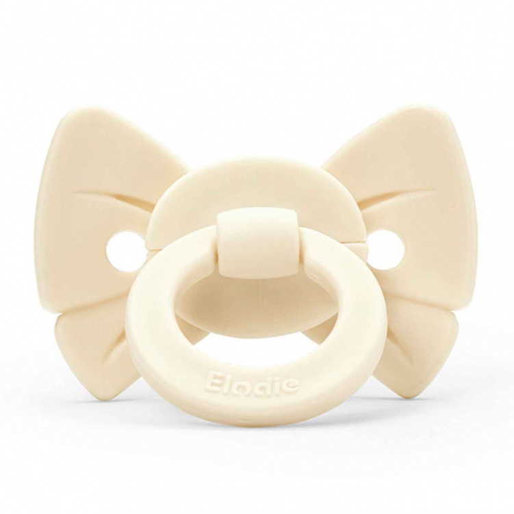 Elodie Binky Bow Napp Silikon 0-6 mån Oat White i gruppen Babytillbehör / Nappar och tillbehör / Nappar 0-6 månader hos Bonti (ELOD30108200208NA)